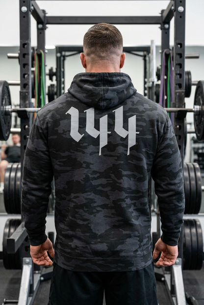 Sudadera DPF de camuflaje negro, vista trasera del gráfico gris en gimnasio
