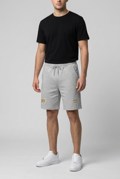 Shorts DPF Immortal grises con modelo masculino, imagen generada con IA